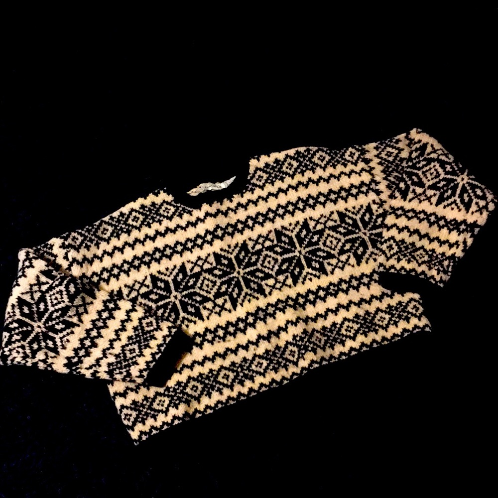 Cream and black 100% wool, cropped sweater in a size medium. Very, very cute on!
